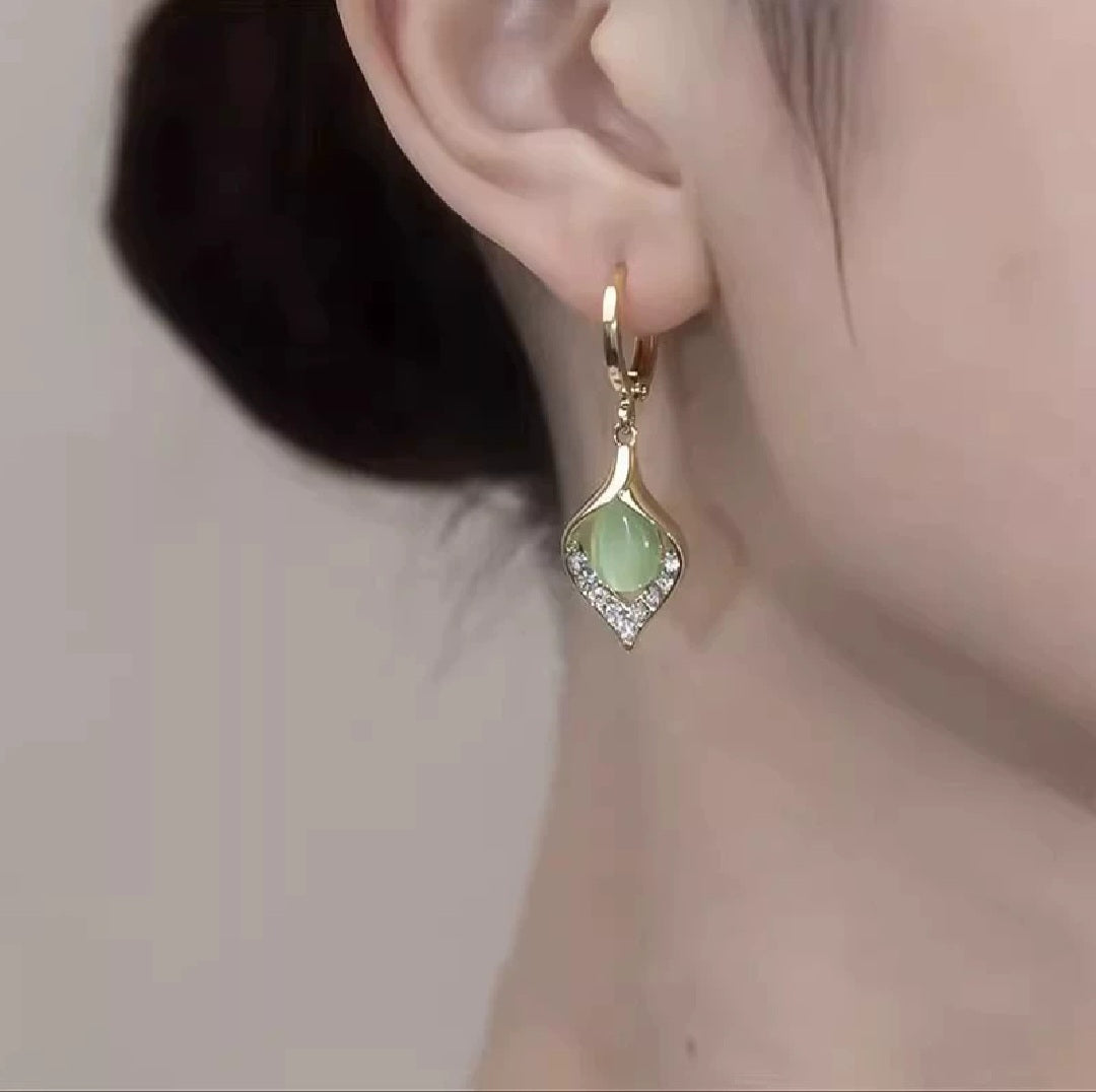 The "Emerald Dew" Dangles Earrings π